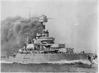 A large military vessel, the USS Tennessee, at sea