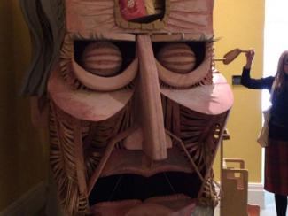 Interactive sculpture of Sam Watkins' head made of wood and paper.