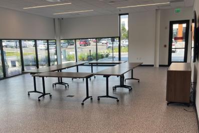 Meeting room with table and chairs.